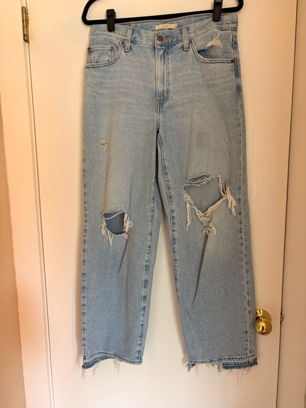 Levi’s “Baggy Dad” Light Blue Distressed Women’s Jeans